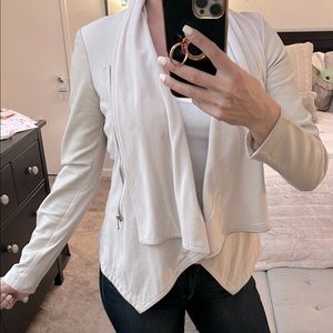 Inc light pleather jacket , really stylish with tank and jeans. Vegan